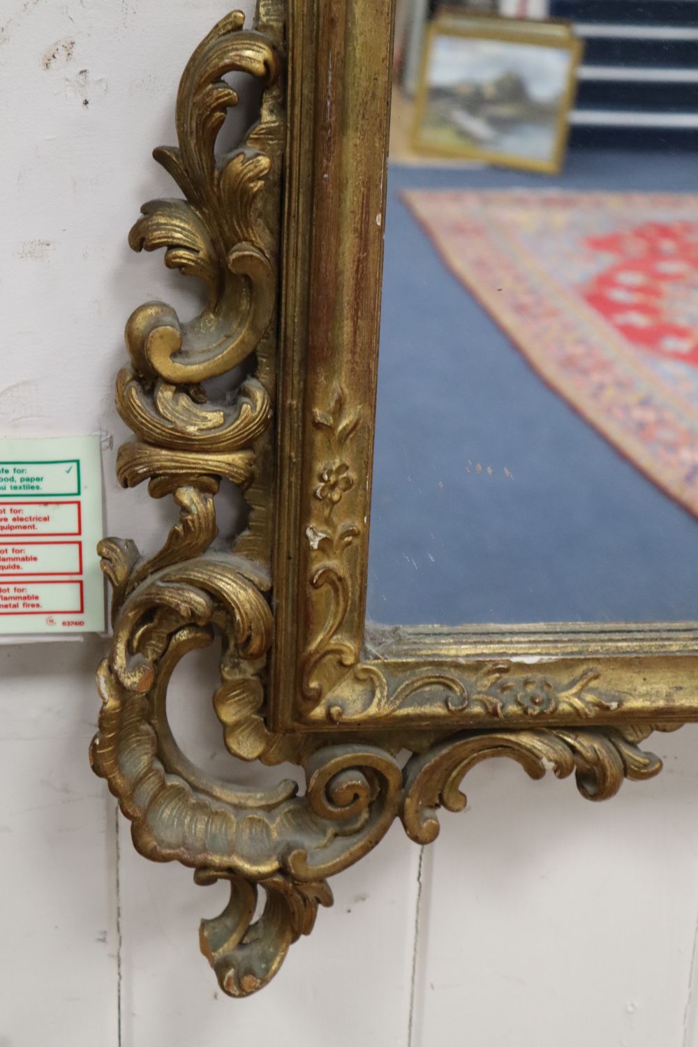 An 18th century style rococo gilt framed wall mirror, width 108cm height 184cm